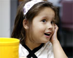 Listening to her first sounds with the aid of a cochlear implant